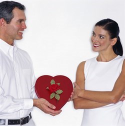 Man Offering Woman Valentine Chocolates